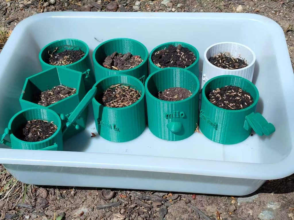 Sprouting seeds in student-designed 3D printed planters at MGA Boston
